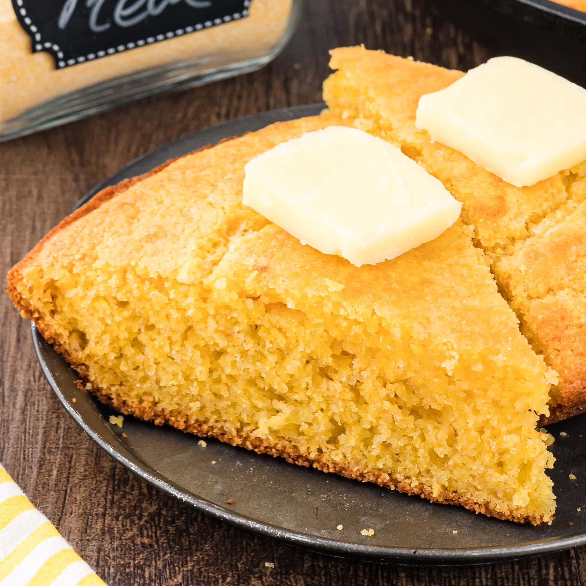 up close picture of corn bread with butter