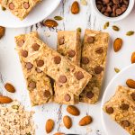 Baked granola bars on a table and plates.