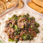 Beef and broccoli served on rice.