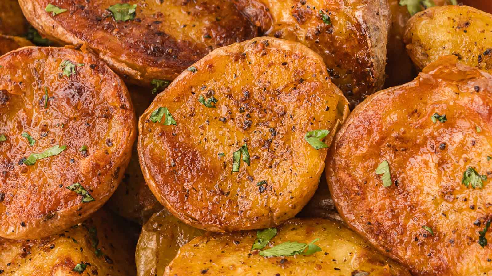 Up close of a crispy air fryer roast potatoes.