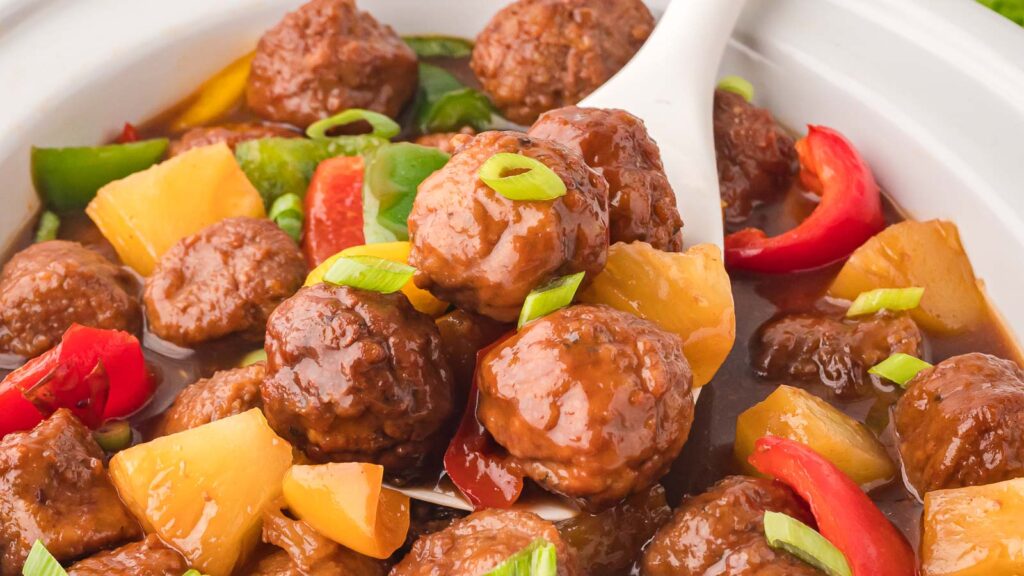 Slow Cooker Sweet and Sour Meatballs by Tessie's Table.