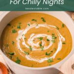 Pot of creamy homemade vegetable soup, also known as Irish funeral soup, with a cream swirl and parsley by Tessie's Table.