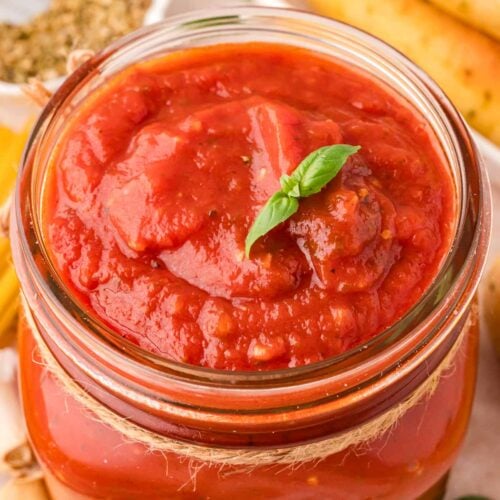 Up close of the inside of a jar of Homemade Marinara Sauce.