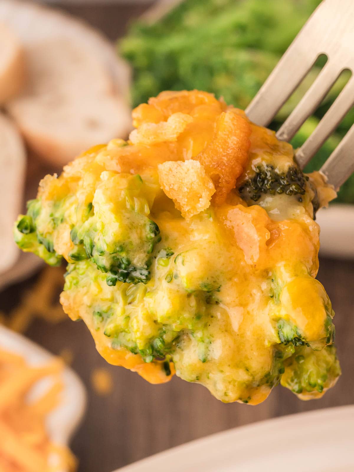 Fork full of Southern Broccoli Casserole.