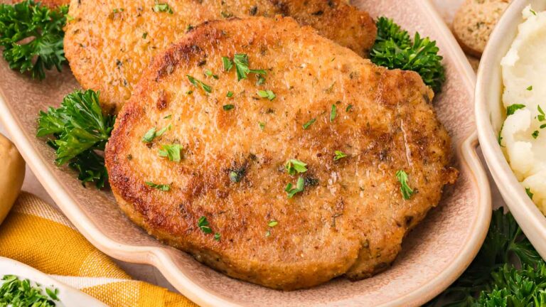 Parmesan Crusted Pork Chops by Tessie's Table.