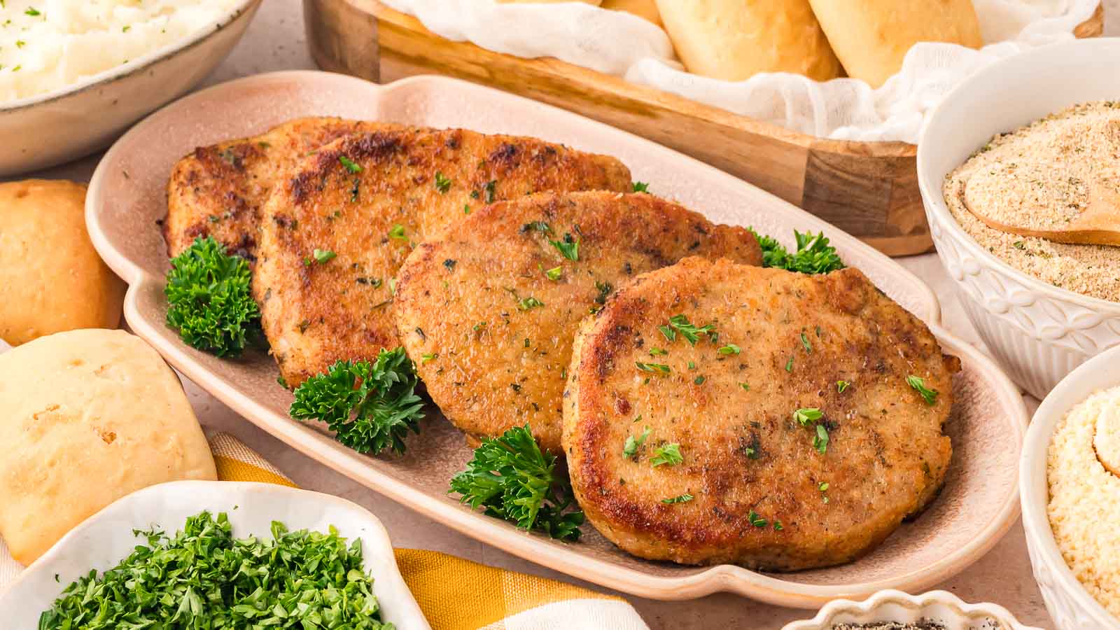 Parmesan Crusted Pork Chops by Tessie's Table.