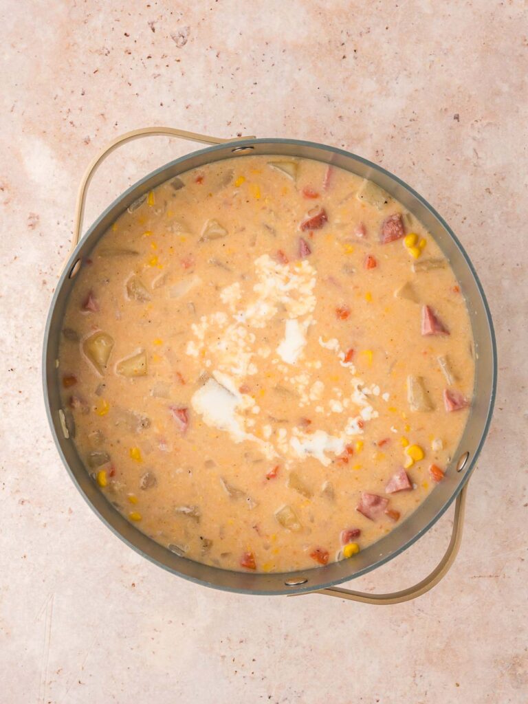 The creamy onion micture poured into the pot with the potatoes, carrots, sweet corn and ham.