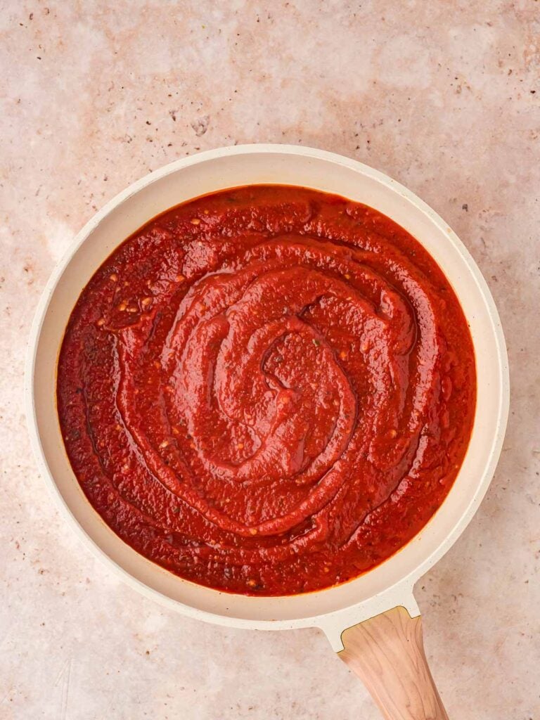 The Homemade Marinara Sauce cooking in the pan.