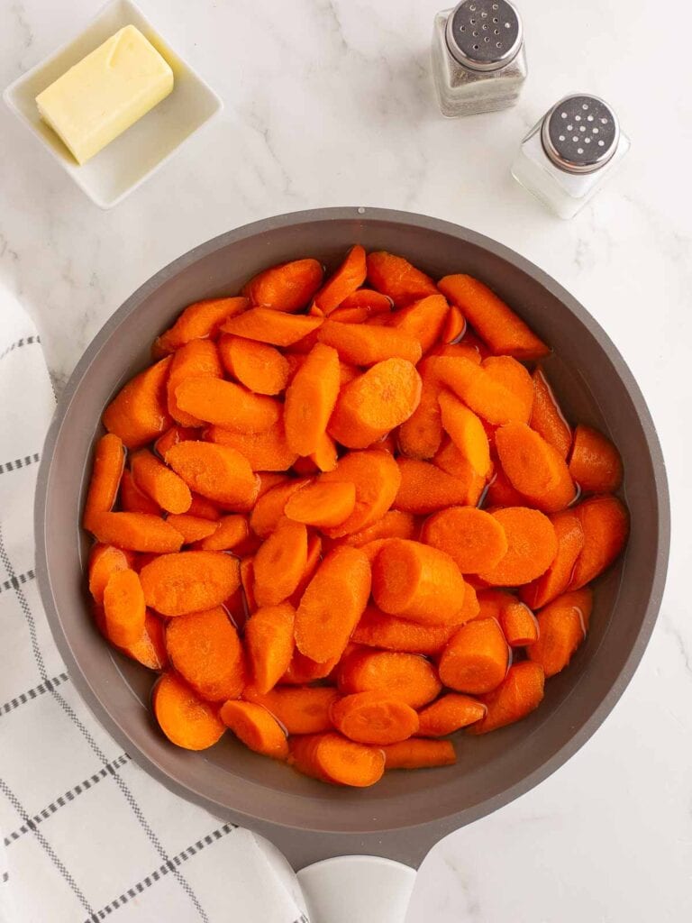 Boiled Carrots in a skillet.