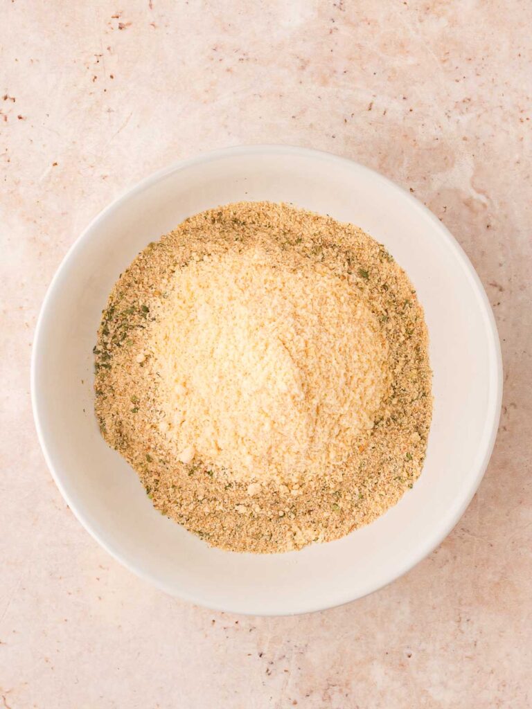 All the dry ingredients to make the breading in a bowl.