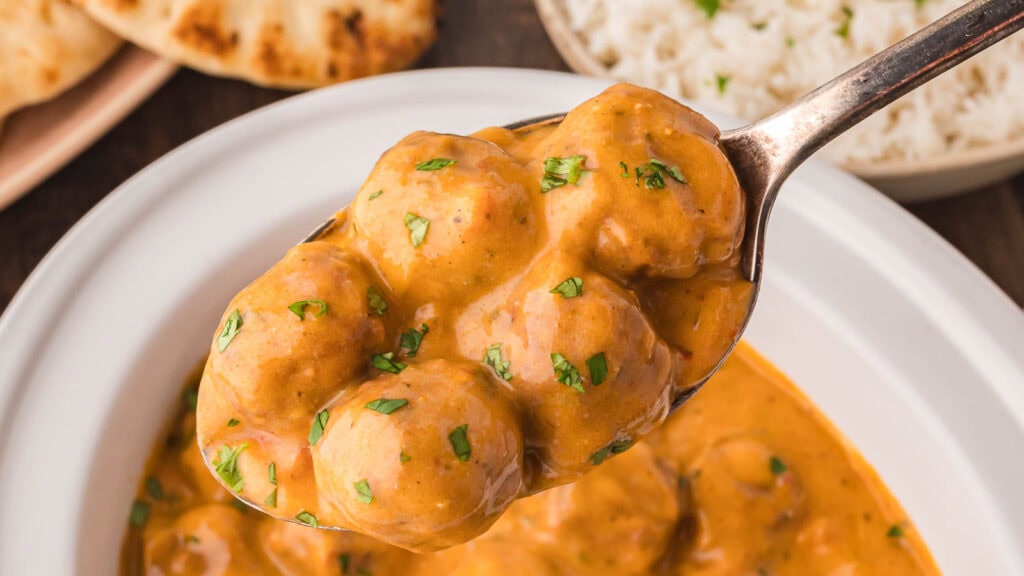Slow Cooker Butter Chicken Meatballs by Tessie's Table.