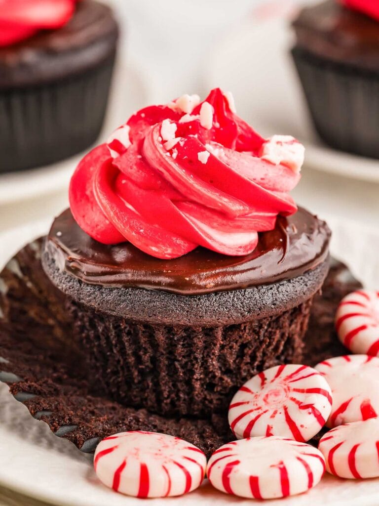 Chocolate Peppermint Cupcake with the wrapper being pulled off.