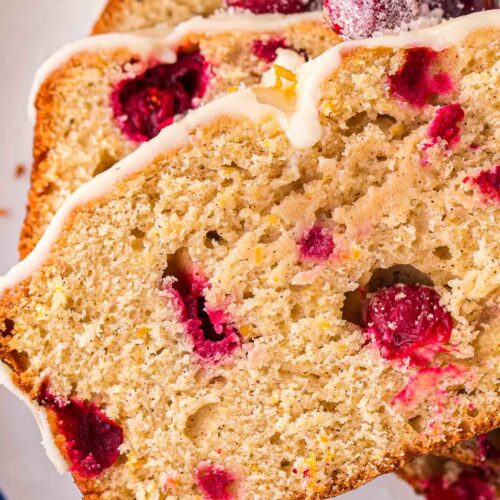 Up close of a slice of Cranberry Orange Bread.