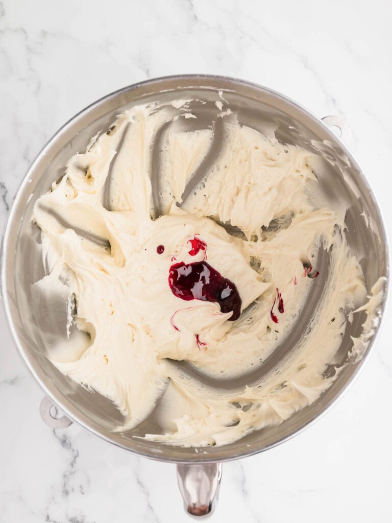 Red Food dye in the cream cheese mixture.