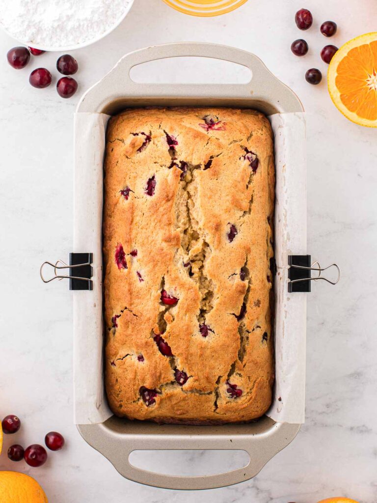 Cooked Cranberry Orange Bread in a loaf pan.