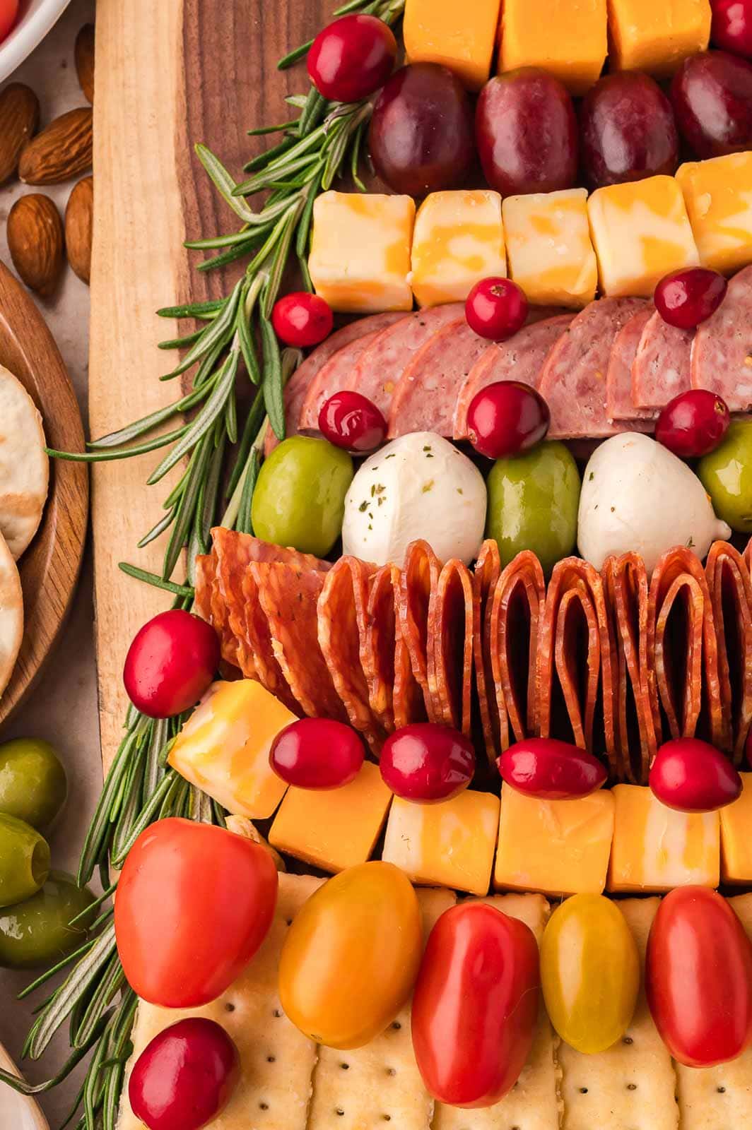 Up close of the layers of a Christmas Tree Charcuterie Board .