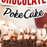 Hot chocolate poke cake with whipped cream and marshmallows.