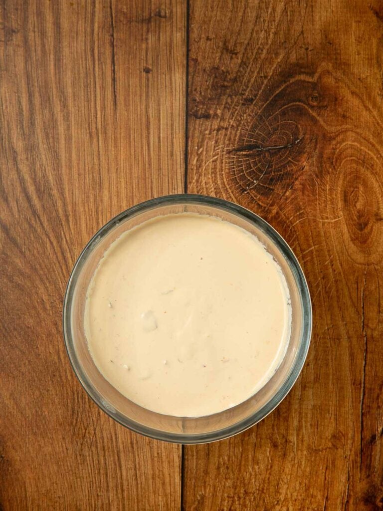 warmed up queso in a bowl.