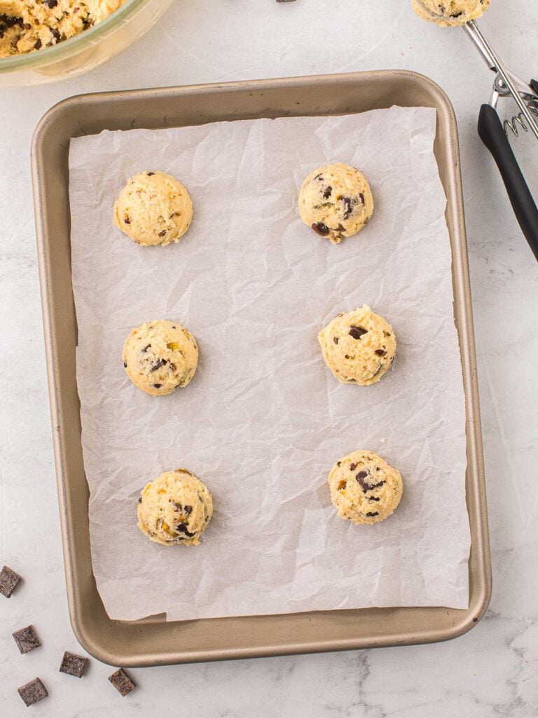 Raw Pistachio Cookies on a cookie tray.