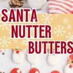 Up close of a Santa Nutter butter on a white wooden table.