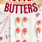 Up close of a Santa Nutter butter on a white wooden table.