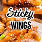 Golden honey garlic wings baked until crispy, coated in sticky glaze and garnished with sesame seeds.