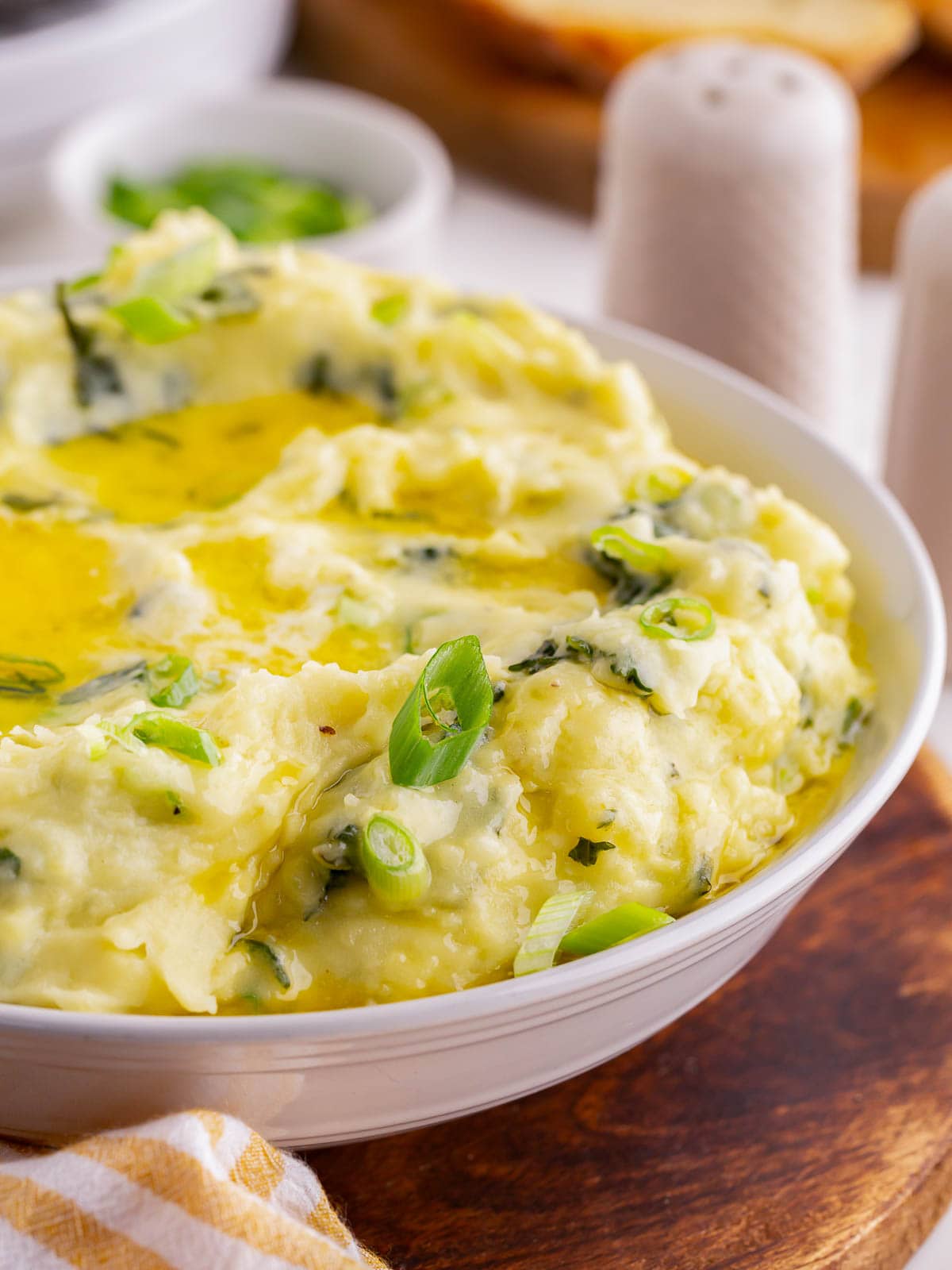 Up close of Colcannon in a white bowl.