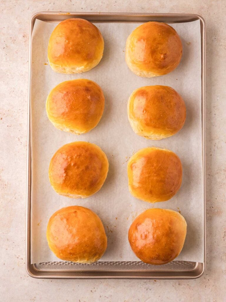 Baked Brioche Bubs with a shiny top.