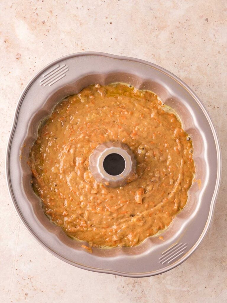 Cake batter in a bundt cake pan.