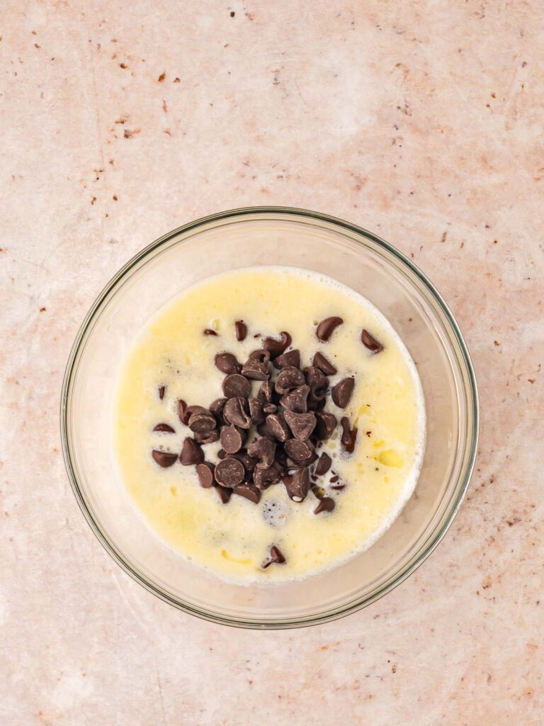 Ingredients for chocolate ganache in a bowl.