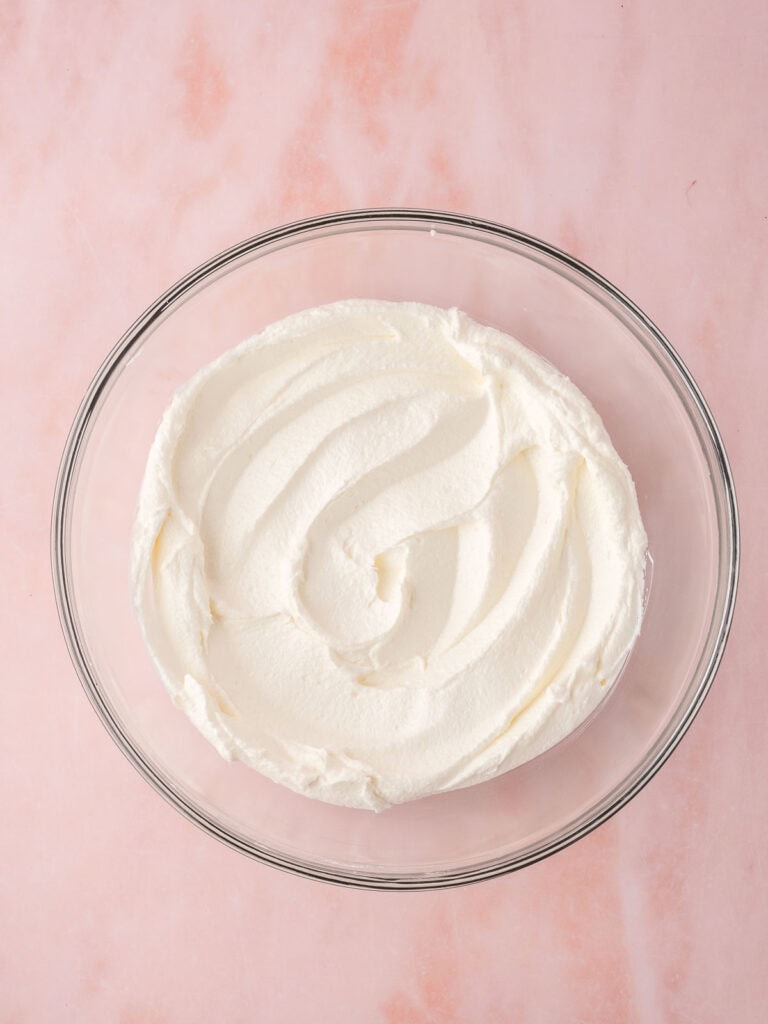 Creamed butter and sugar in a bowl.