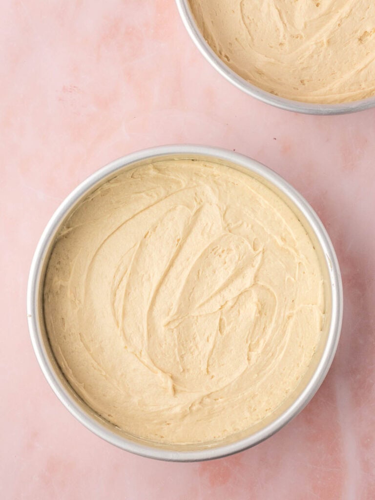 The uncooked batter in two 8' pans.