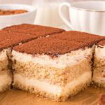 Inside shot of Tres Leches Tiramisu in a pan.