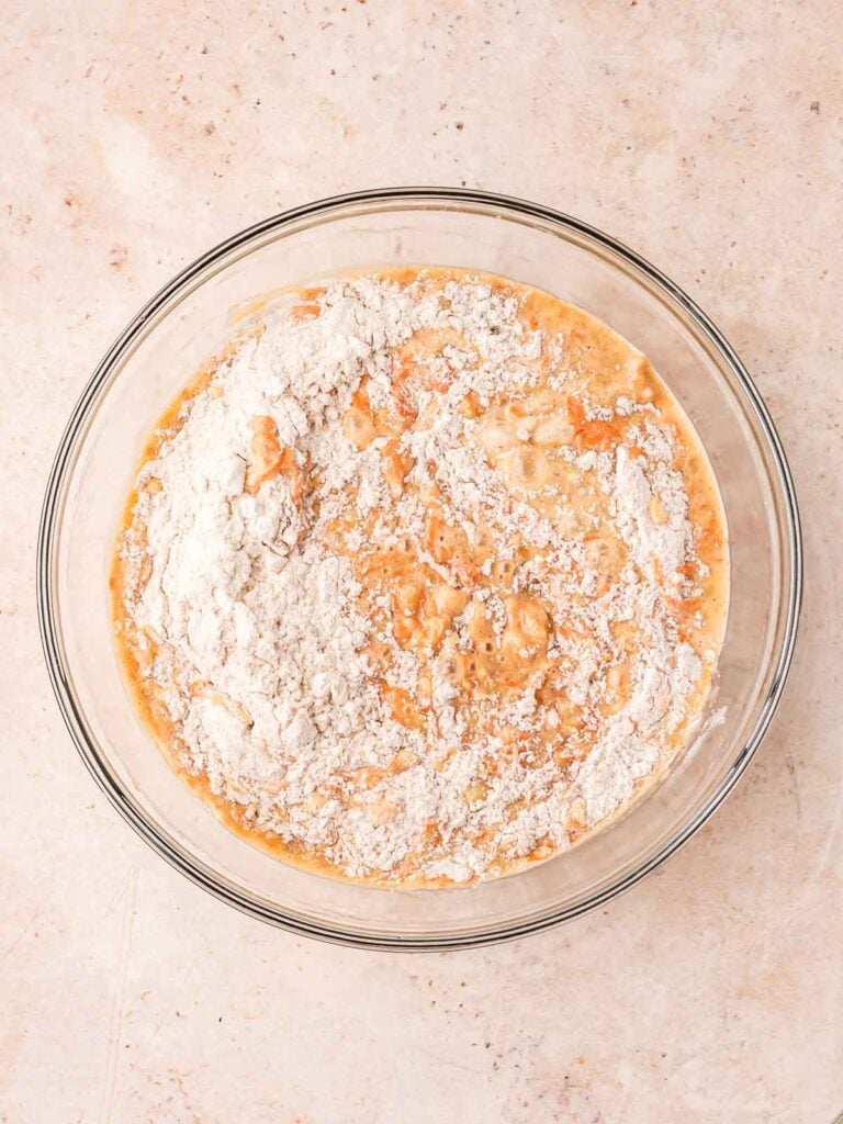 Dry ingredients and wet ingredients in a bowl together.