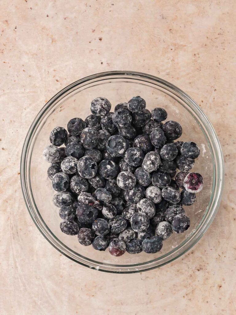 Fresh blueberries tossed in flour to keep them from sinking in muffin batter.