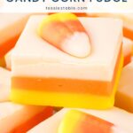 Close-up of a candy corn fudge square showing yellow, orange and white layers by Tessie's Table.