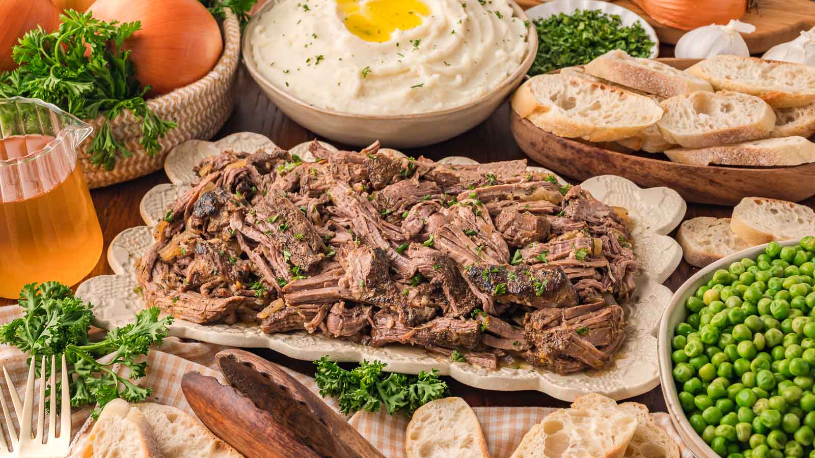 Slow Cooker Shredded Beef by Tessie's Table.