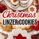 Festive Christmas Linzer cookies with red and orange jam centers on a holiday platter.