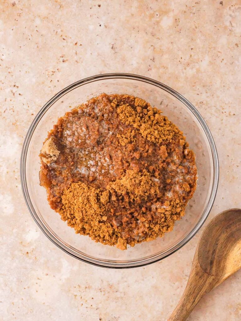 Bowl of crumb mixture with spoon