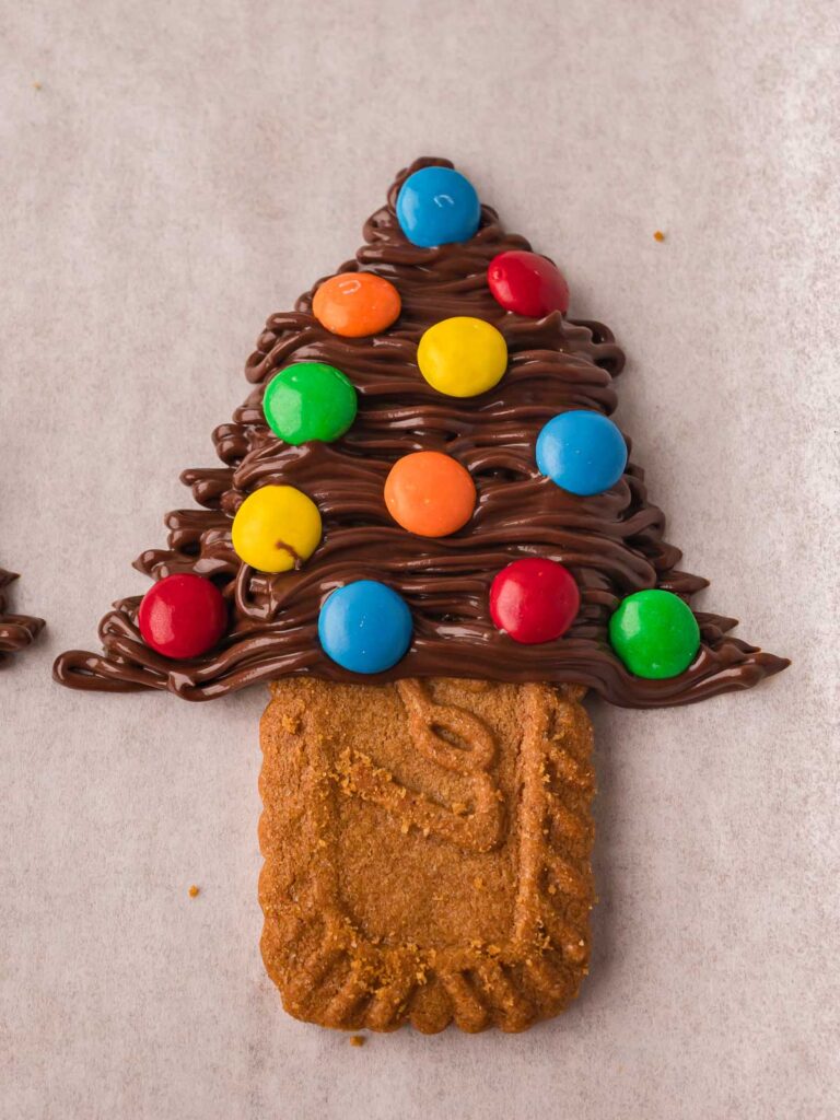 Decorated Chocolate Christmas Trees with mini M&M candies before chilling.