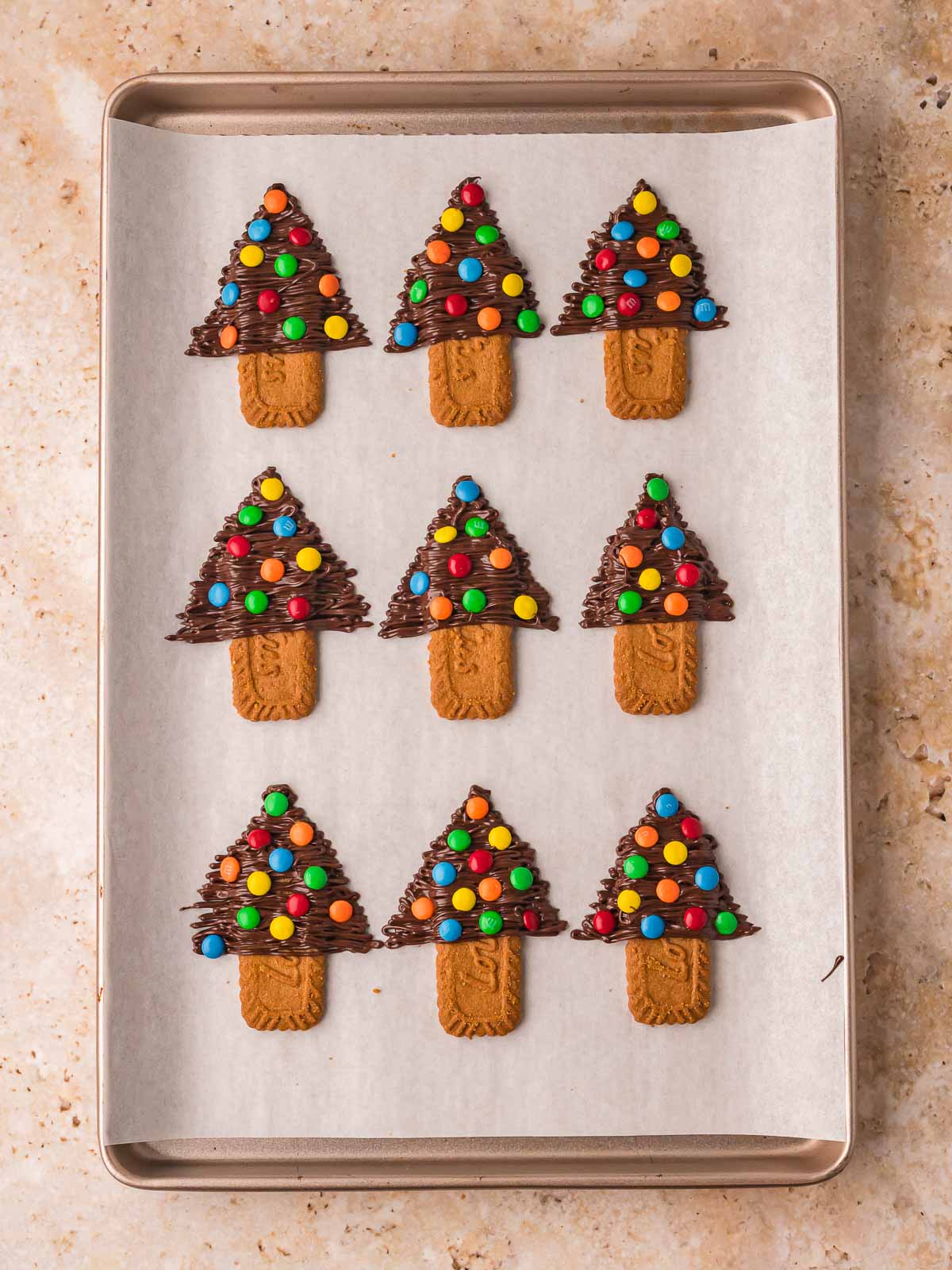 Finished Chocolate Christmas Trees set on parchment paper, ready to serve.