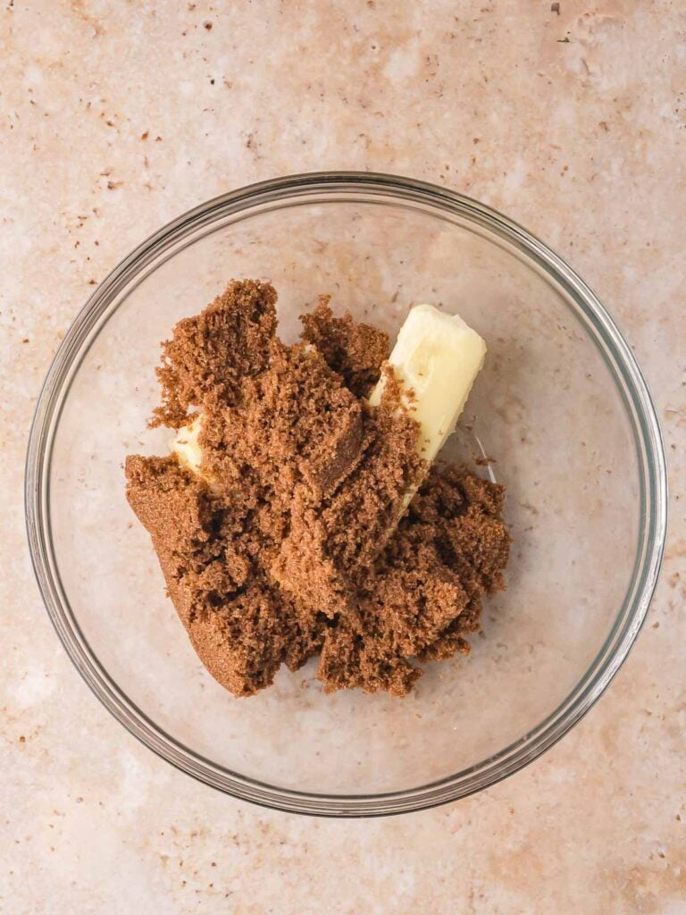 Bowl with butter and brown sugar for Gingerbread Man Cookies before mixing.