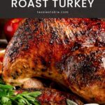 Close-up of crispy golden roast turkey skin with fresh sage and parsley by Tessie's Table.