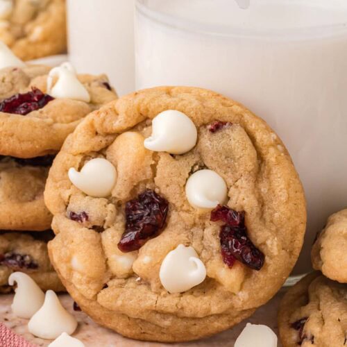 Single white chocolate cranberry cookie showing soft center and balanced sweet and tart mix-ins.