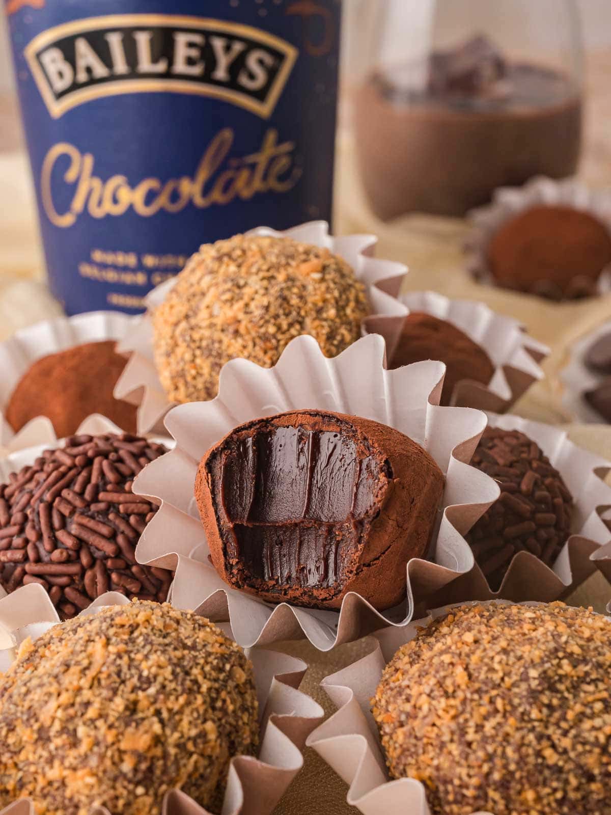 Chocolate Baileys truffle cut open showing rich chocolate ganache center.