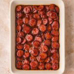 BBQ sausage bites baked until caramelized with thick sticky BBQ sauce.