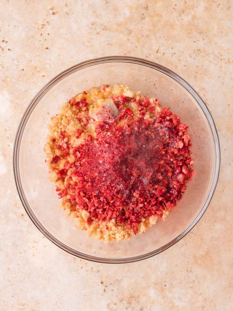 Crushed Golden Oreos and freeze-dried strawberries mixed with butter for the strawberry crunch topping.