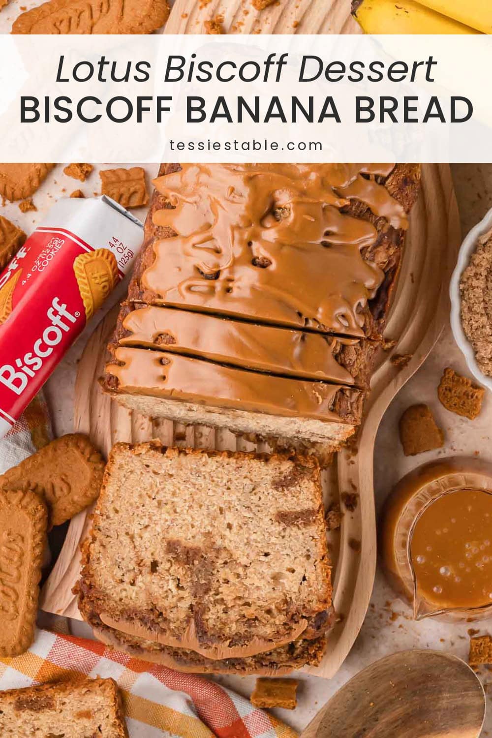 Overhead view of Biscoff banana bread with a cookie butter topping, surrounded by Lotus Biscoff cookies, a pack of Biscoff and bananas.